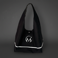 Black tote bag with a white logo on a dark gray background